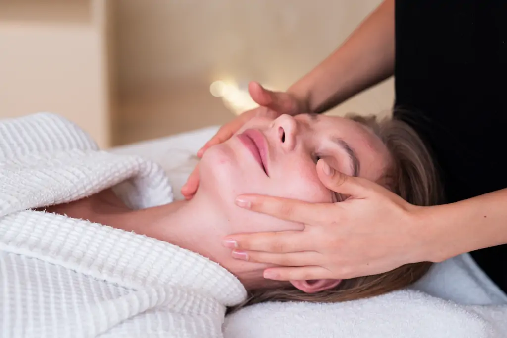 close up girl getting facial treatment